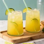 Refreshing homemade electrolyte drink served in a glass with lemon and orange slices